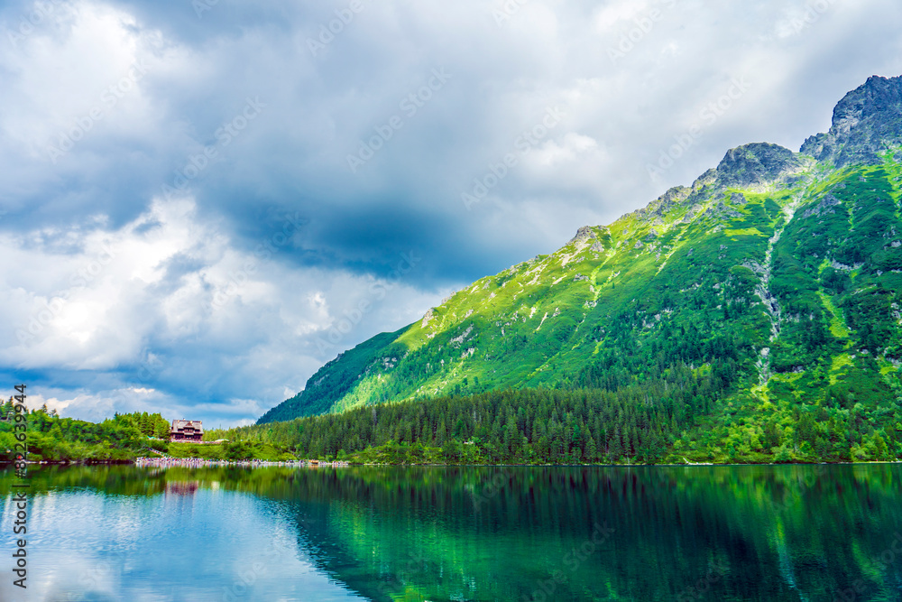 Tatra National Park in Poland. Mountains lake Morskie oko or Sea Eye lake In High Tatras. Five lakes valley Tatra National Park in Poland. Mountains lake Morskie oko or Sea Eye lake In High Tatras. Five lakes valley