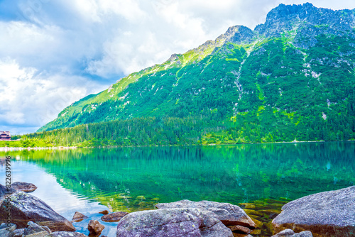 Fototapeta Naklejka Na Ścianę i Meble -  Tatra National Park in Poland. Mountains lake Morskie oko or Sea Eye lake In High Tatras. Five lakes valley