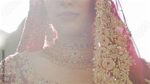 A Shot of an Indian Bride showing her Bridal Jewellery at her Indian Wedding in India