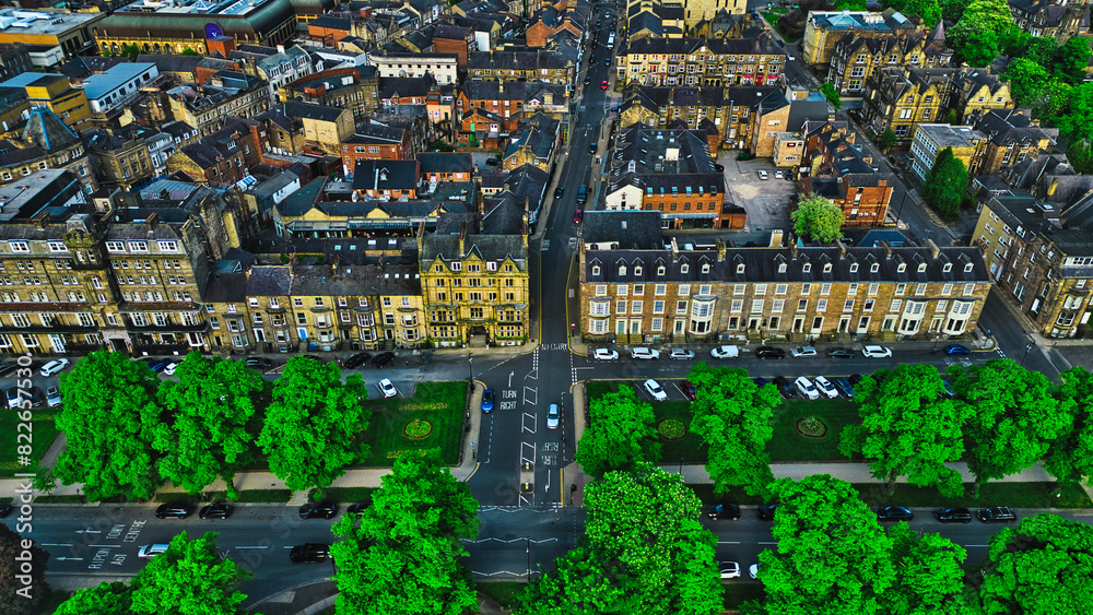 Fototapeta premium Aerial view of cityscape with historic and modern buildings in Harrogate, North Yorkshire
