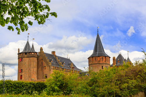 Netherlands, Muiden. Muiderslot Castle located on Vecht River. Fortress for water defense. photo