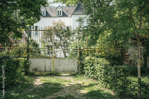 white gate of an old house