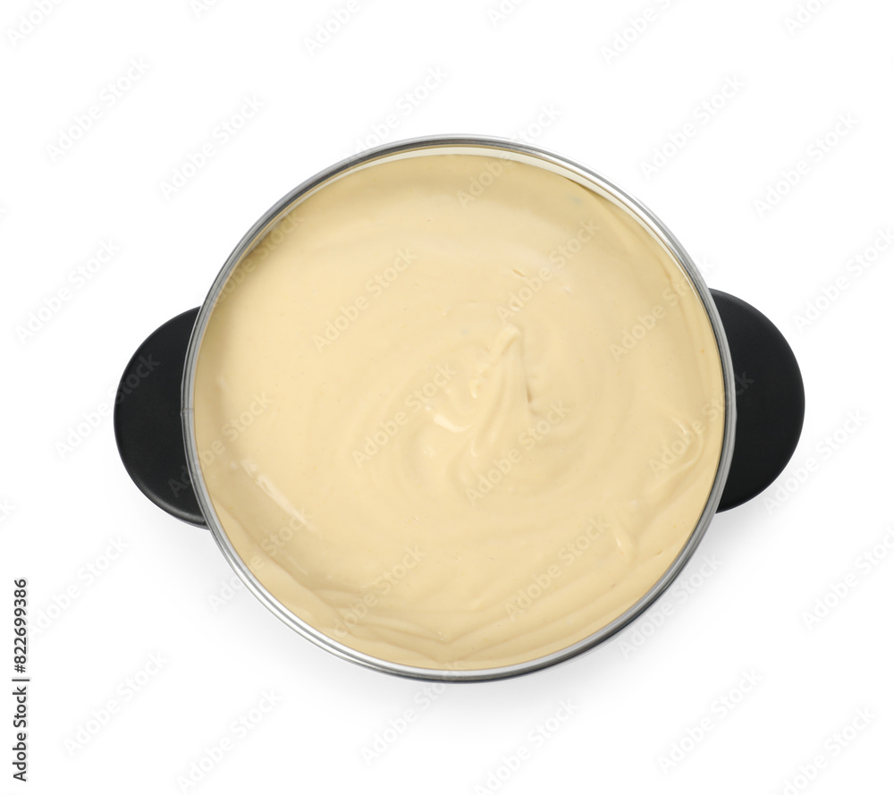 Fondue pot with tasty melted cheese isolated on white, top view