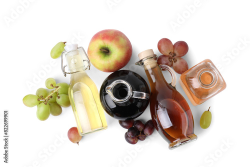 Different types of vinegar and ingredients isolated on white, top view © New Africa