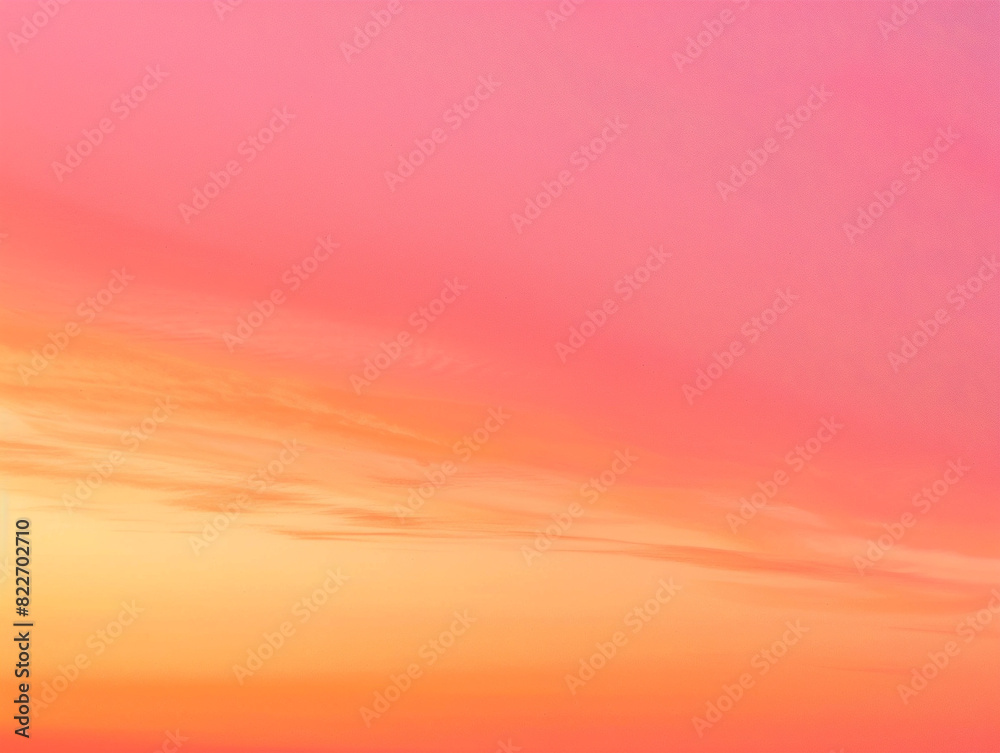 A beautiful gradient of orange and pink colors transitioning from sunrise to sunset in nature.