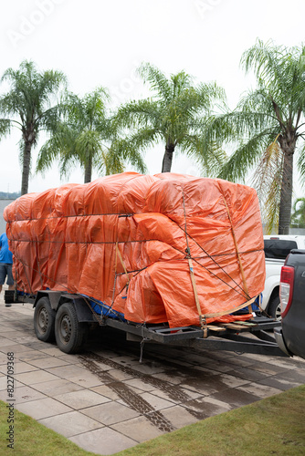 truck with donation boxes and plastic bag on top for those affected by floods in southern Brazil