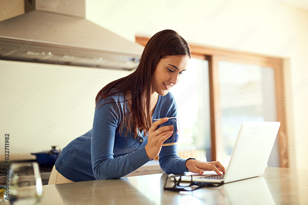 Woman, communication and laptop for search, kitchen and remote work with internet, contact or review. Email, technology and research for girl typing at home for online, writing and report with coffee