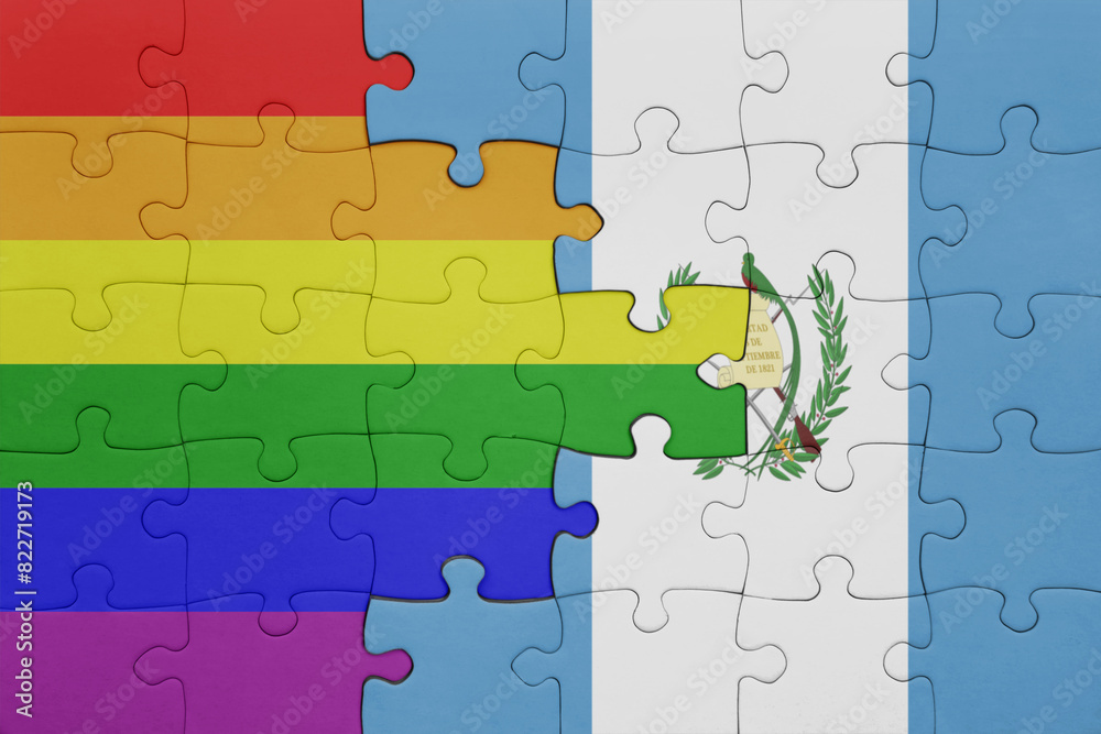 puzzle with the colourful national flag of guatemala and rainbow gay pride flag . puzzle with the colourful national flag of guatemala and rainbow gay pride flag .