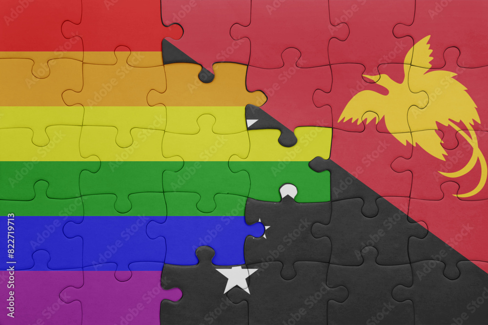 puzzle with the colourful national flag of Papua New Guinea and rainbow ...