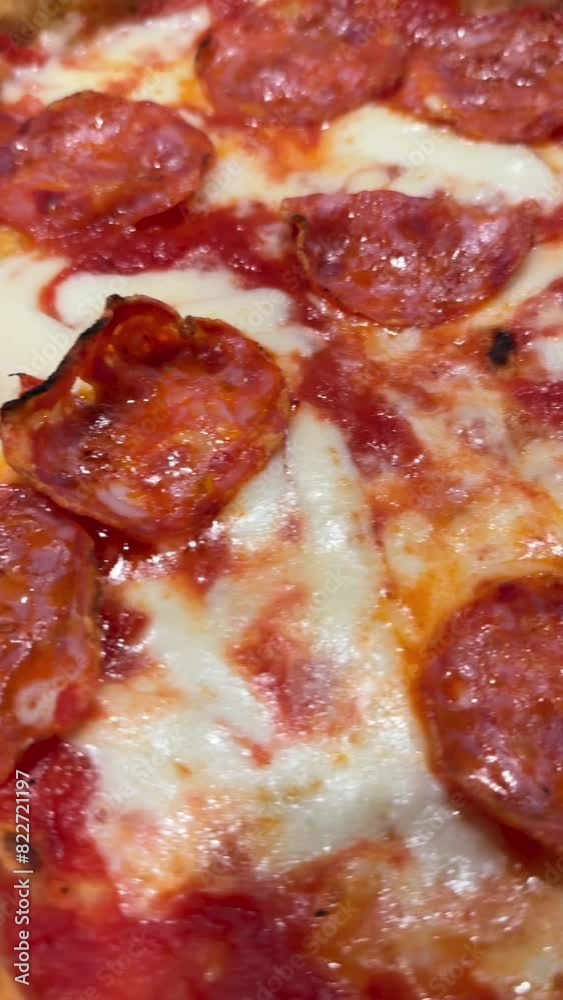 Top view of a delicious and aromatic Italian pizza. Top view of a delicious and aromatic Italian pizza.