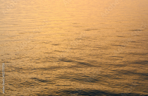 beautiful spring sunset of the Mediterranean sea golden waves at sunset