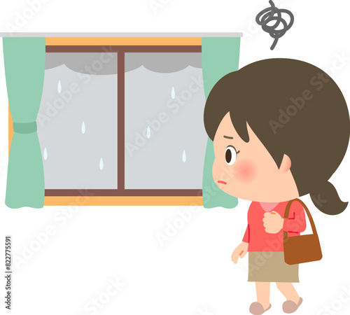 外が雨天で困っている外出前の女性