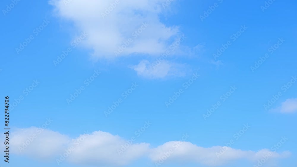 The dynamic skies of a 4K time lapse, where clouds evolve and float in a brilliant blue sky, showcasing the beauty of weather in motion. Meteorology concept. Video clips. Timelapse. Sky background.
The dynamic skies of a 4K time lapse, where clouds evolve and float in a brilliant blue sky, showcasing the beauty of weather in motion. Meteorology concept. Video clips. Timelapse. Sky background.