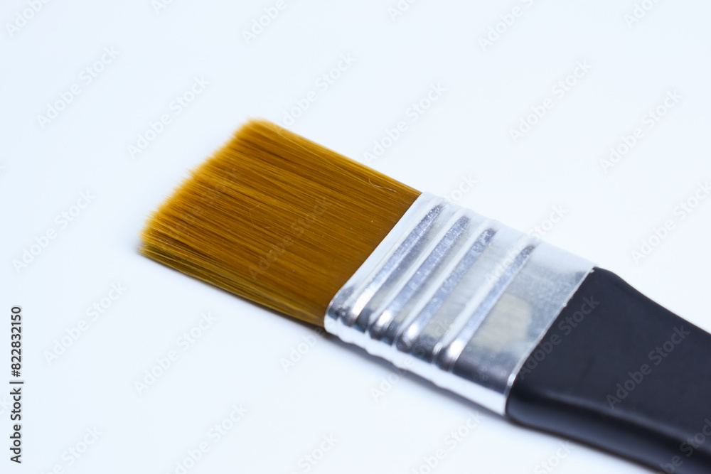 Fototapeta premium single paintbrush isolated on white background, object for art work