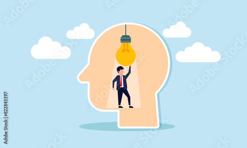 Creative genius brain, smart thinking, emotional intelligence, wisdom, and intuition, concept of Intelligent man activates lightbulb idea inside his brilliant mind