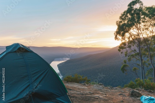Serene Sunrise Camping  Tent Overlooking a Mountain Valley at Dawn  an Invitation to Nature s Tranquility