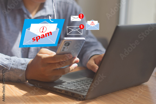 cyberspace and internet security concept,  phishing alert warning scam, spam, malware, and spyware viruses with warning caution for notification. inbox receiving electronic message aler photo