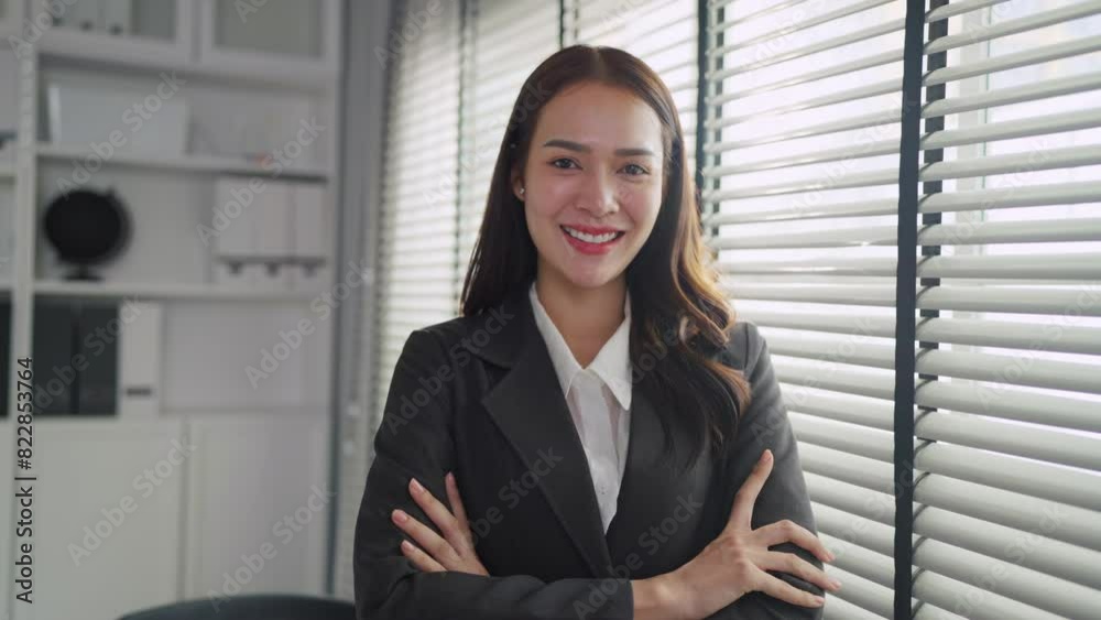 Portrait of Asian beautiful businesswoman smiling while working in office. Portrait of Asian beautiful businesswoman smiling while working in office.