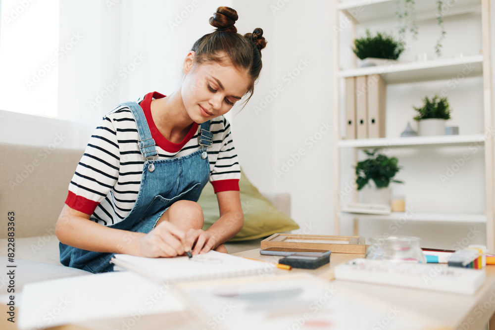 Happy Teenage Girl Painting a Cute Portrait of a Colorful Picture Happy Teenage Girl Painting a Cute Portrait of a Colorful Picture