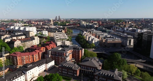 Aerial Boom Shot Reveals Klara Sjö Canal in Stockholm, Sweden on Beautiful Day photo