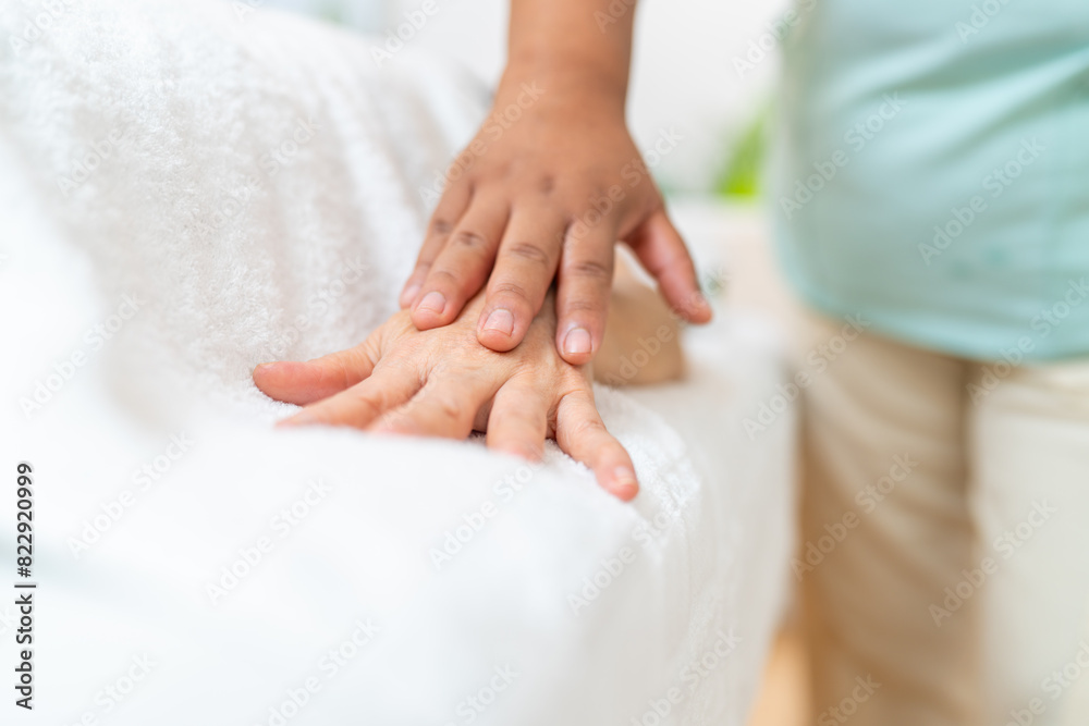 Relaxing hand massage for a client at the spa Relaxing hand massage for a client at the spa