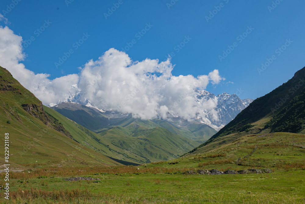 Azure Hues: Blue Skies Melding Seamlessly with Green Mountains Azure Hues: Blue Skies Melding Seamlessly with Green Mountains