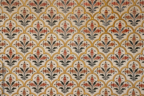 Seamless decorative pattern on the walls of historic Bikaner fort in Rajasthan, India.