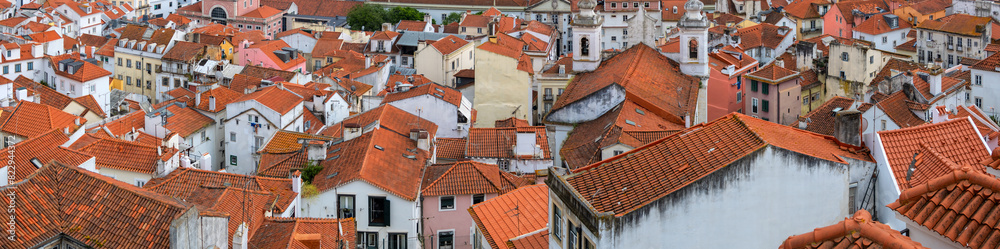 Super panoramic view of skyline of Lisbon city, Portugal, many colorful houses in the Alfama district. Super panoramic view of skyline of Lisbon city, Portugal, many colorful houses in the Alfama district.