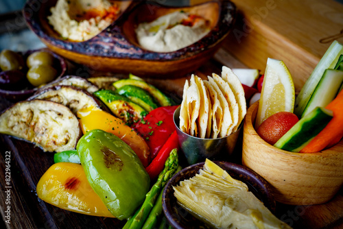 Mezze Plate. Whit Hummus, Olives, Crudites, Pita Bread, Baba Ghanoush. Various appetizing spanish mezze dishes.