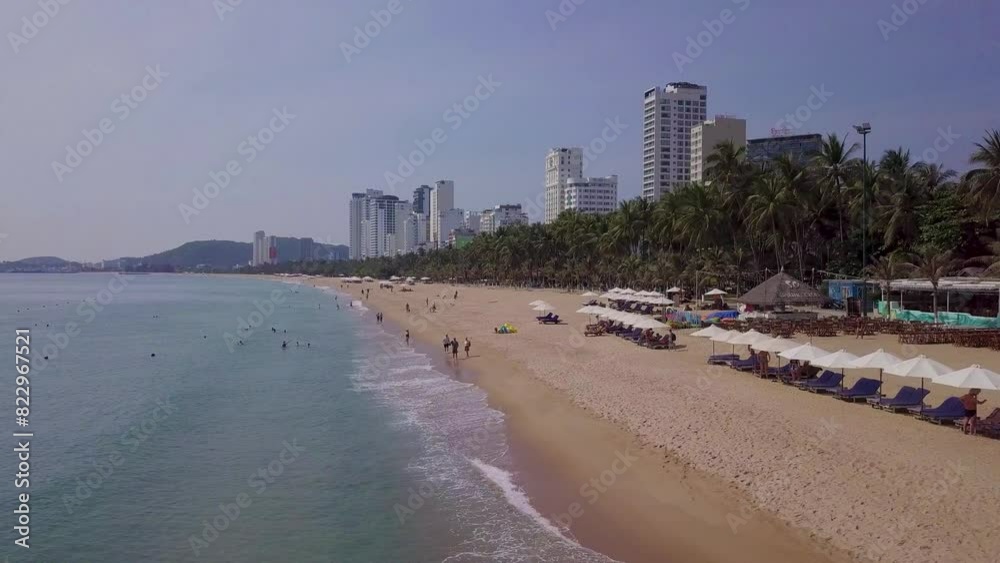 the camera flies slowly over the beach of Nha Trang the camera flies slowly over the beach of Nha Trang