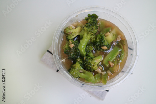 Obraz na plátně Stir fried broccoli or ca broccoli with thick sauce made from cornstarch