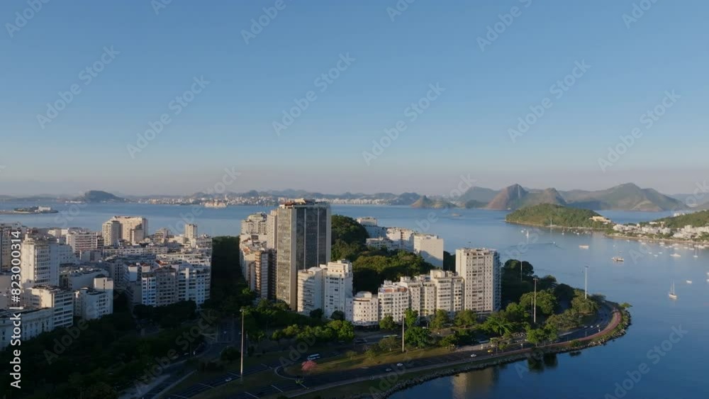 Aerial flyover of an peninsula off Botafogo Bay in Rio de Janeiro with roads and apartment buildings. Aerial flyover of an peninsula off Botafogo Bay in Rio de Janeiro with roads and apartment buildings.
