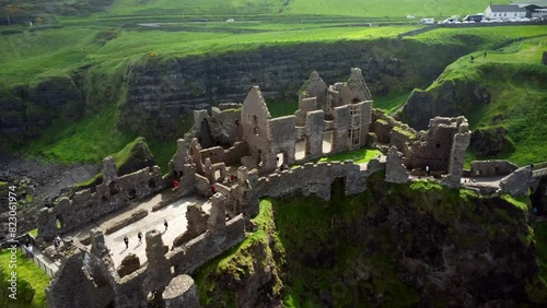 Aerial shot of Dunluce Castle, in Bushmills on the North County Antrim coast in Northern Ireland.

The camera moves from left to right.

Produced in 4K, 30fps and in Rec709 color. photo