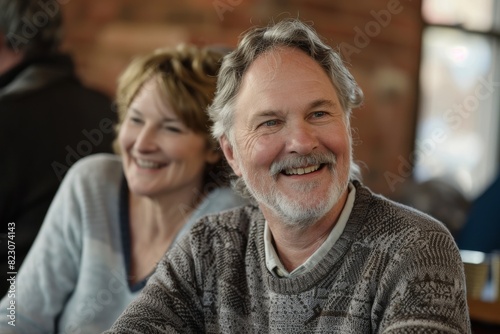Portrait of a smiling senior couple in a restaurant  shallow depth of field