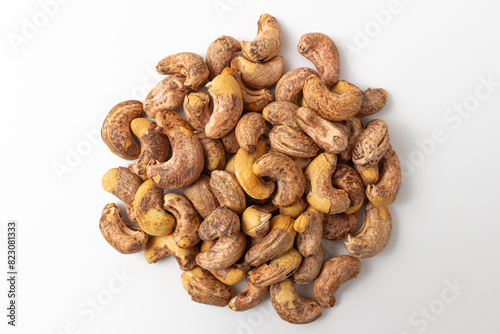 Shelled cashew nuts on white background