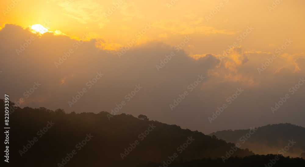 Enjoy a panoramic view of the skyline. The sun rises in the morning sky with colorful clouds. and beautiful cloud patterns In the soft light of the morning Enjoy a panoramic view of the skyline. The sun rises in the morning sky with colorful clouds. and beautiful cloud patterns In the soft light of the morning