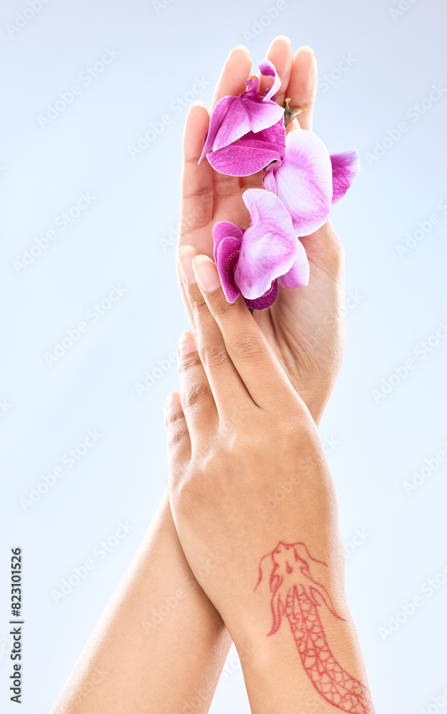 Skincare, hands and closeup of nails with flowers for beauty, tattoo or wellness isolated on white studio background. Fingers, woman or floral manicure in spa for natural cosmetics, health or organic Skincare, hands and closeup of nails with flowers for beauty, tattoo or wellness isolated on white studio background. Fingers, woman or floral manicure in spa for natural cosmetics, health or organic
