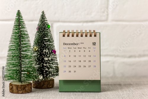 The calendar shows December 2024. Desktop desk calendar. Hello, December.