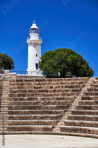 historic lighthouse and ruins of the ancient odeon in the city of Paphos on the island of Cyprus photo
