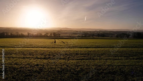 Golden sunrise in a rural area of Scotland in winter in Perth Shire, United Kingdom photo