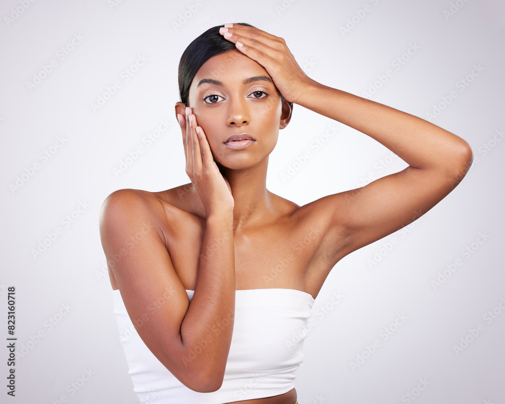 Obraz premium Skincare, model and face for beauty, dermatology and routine facial treatment. Spa, wellness and skin glow aesthetic on white studio background with black woman, cosmetics and luxury collagen shine