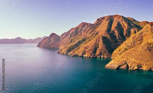 Panorama of the rock in the sea Aerial view. Cabo de Gata-Níjar reserve. El Portus, Almeria Andalusia Spain Horizontal banner