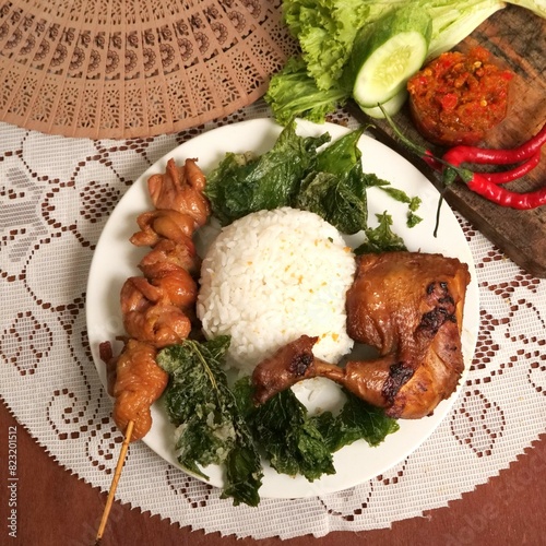 meat with vegetables, ayam goreng, sate kulit