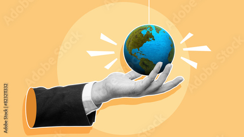 Fototapeta Naklejka Na Ścianę i Meble -  Business hand showing globe