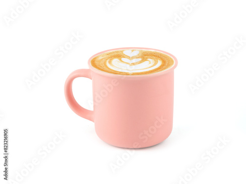 Hot latte coffee with art heart shape in pink ceramic mug isolated on whithe background. space for your text..