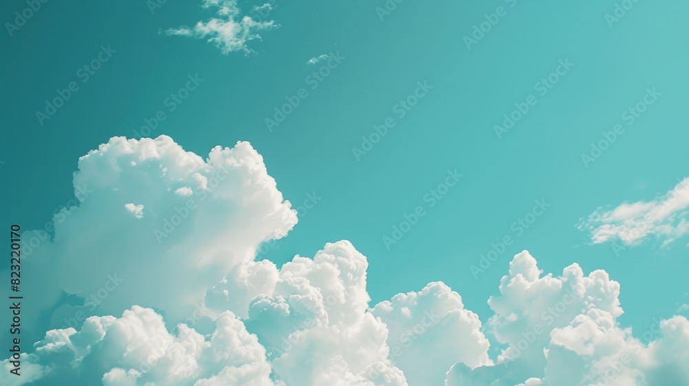 A light blue sky with white clouds A light blue sky with white clouds