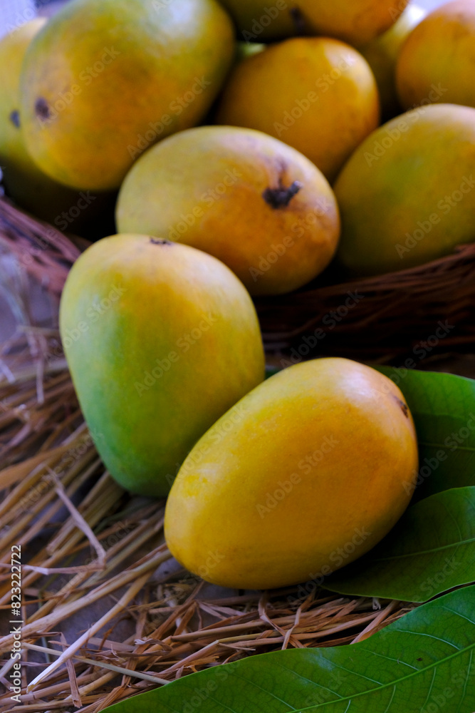 Fresh Organic Ripe Mango Fruit with leaves. Fresh Organic Ripe Mango Fruit with leaves.