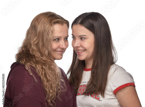 Graceful Duo: Two Women Radiating Elegance in Studio Portraiture