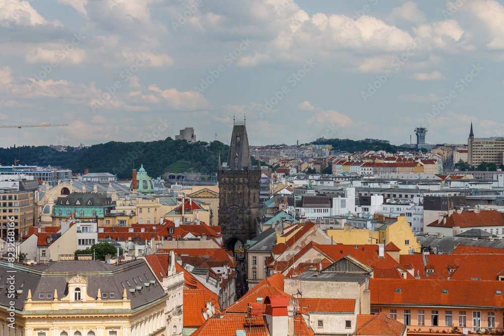 Fototapeta premium Aerial view of the rooftops of the historical buildings in Prague, Czech Republic
