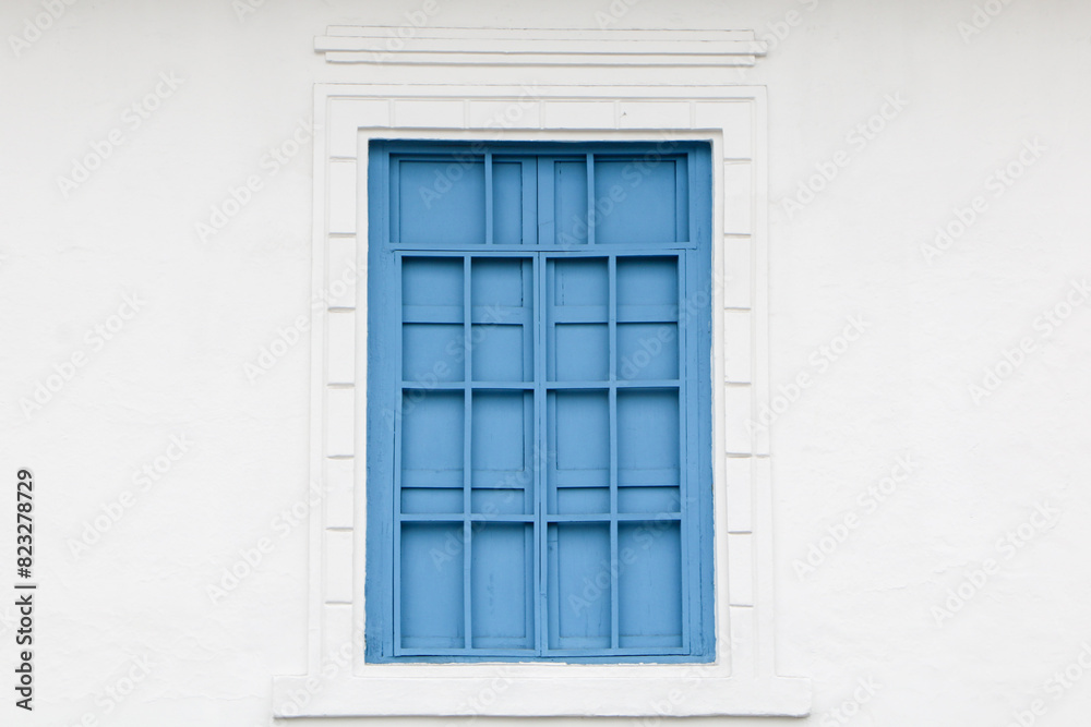 Blue window with shutters